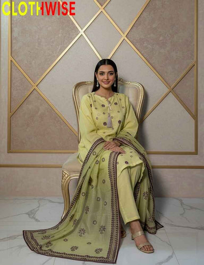 Woman in a yellow traditional outfit sitting on an ornate chair with 'CLOTHWISE' branding.
