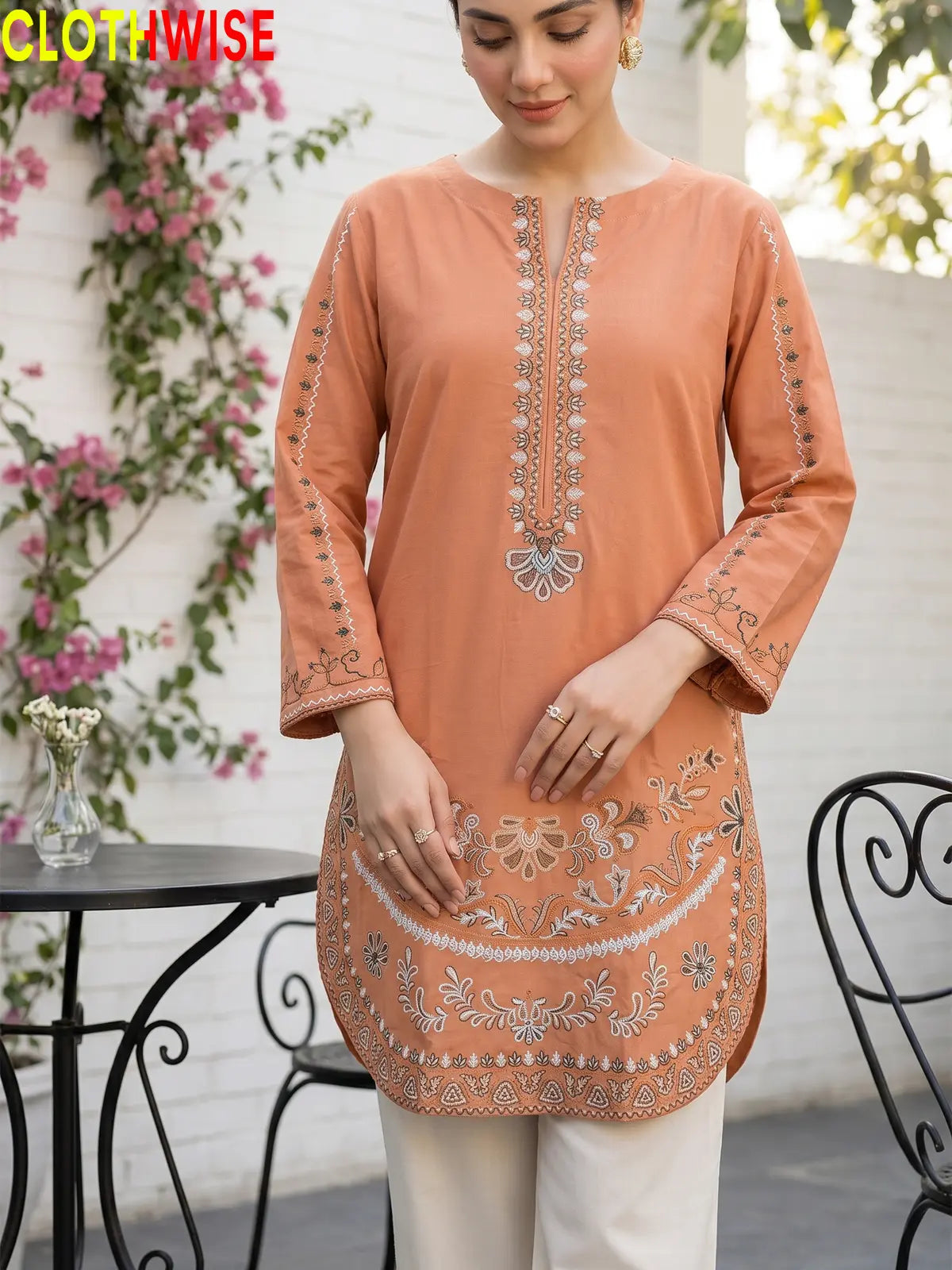 Naqsh Rust embroidered 2-piece cotton suit - close up embroidery detail