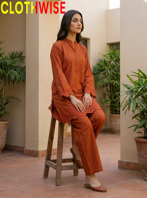 Zimal Rust Chikankari 2-Piece Cotton Suit – Sitting Pose | Clothwise