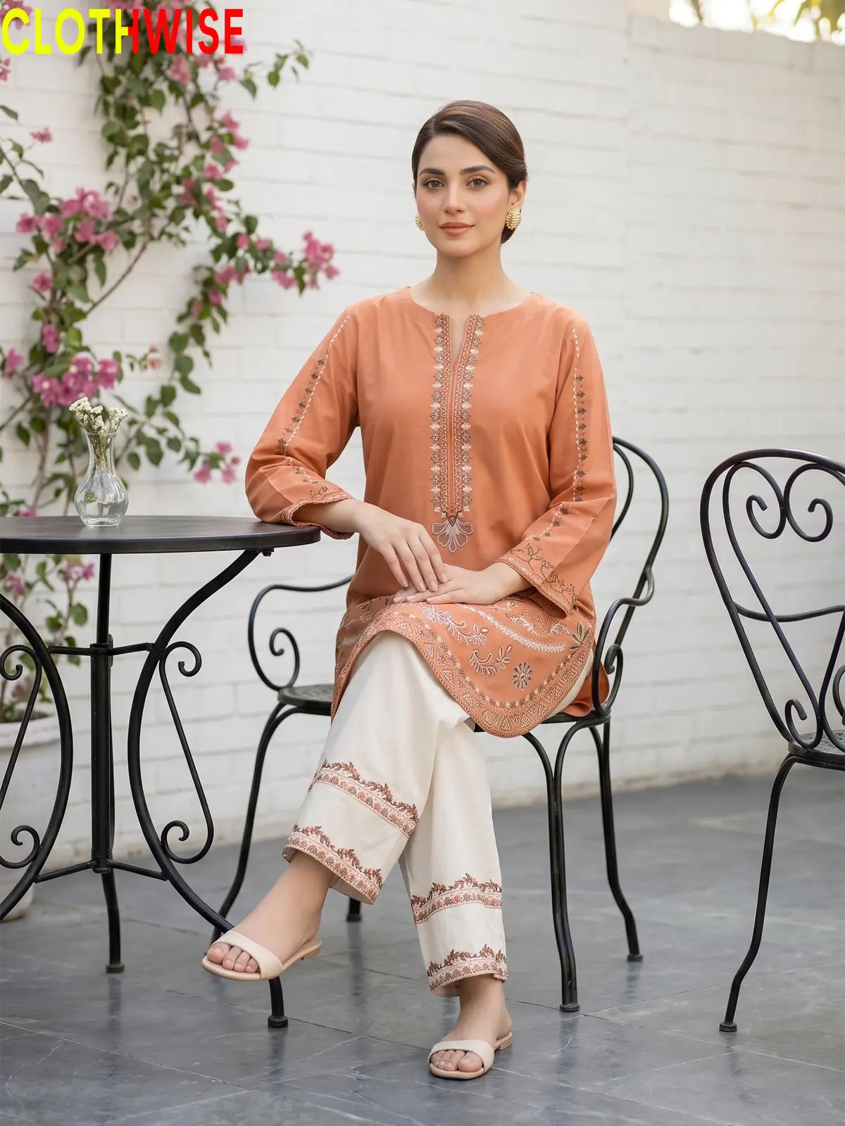 Naqsh Rust embroidered 2-piece cotton suit - sitting view