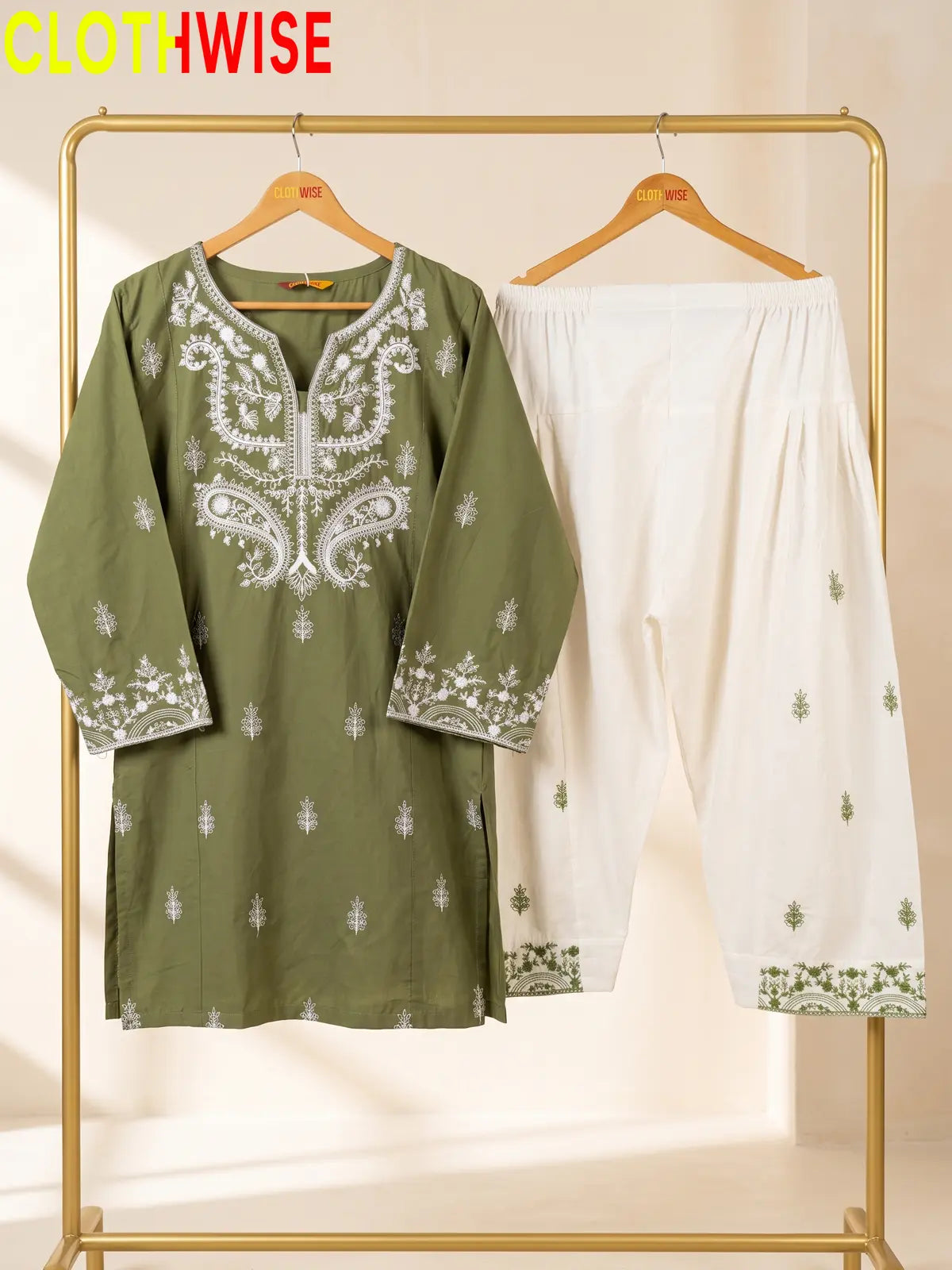 Mushq Sage Green 2-piece embroidered cotton suit on hanger
