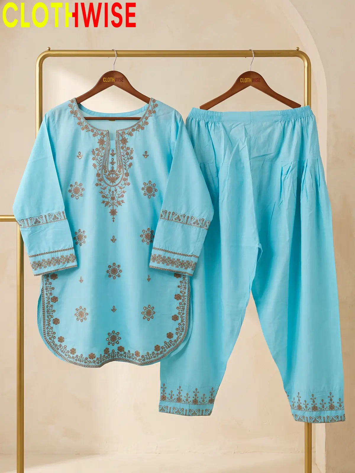 Armaan Sky Blue embroidered lawn suit displayed on hanger