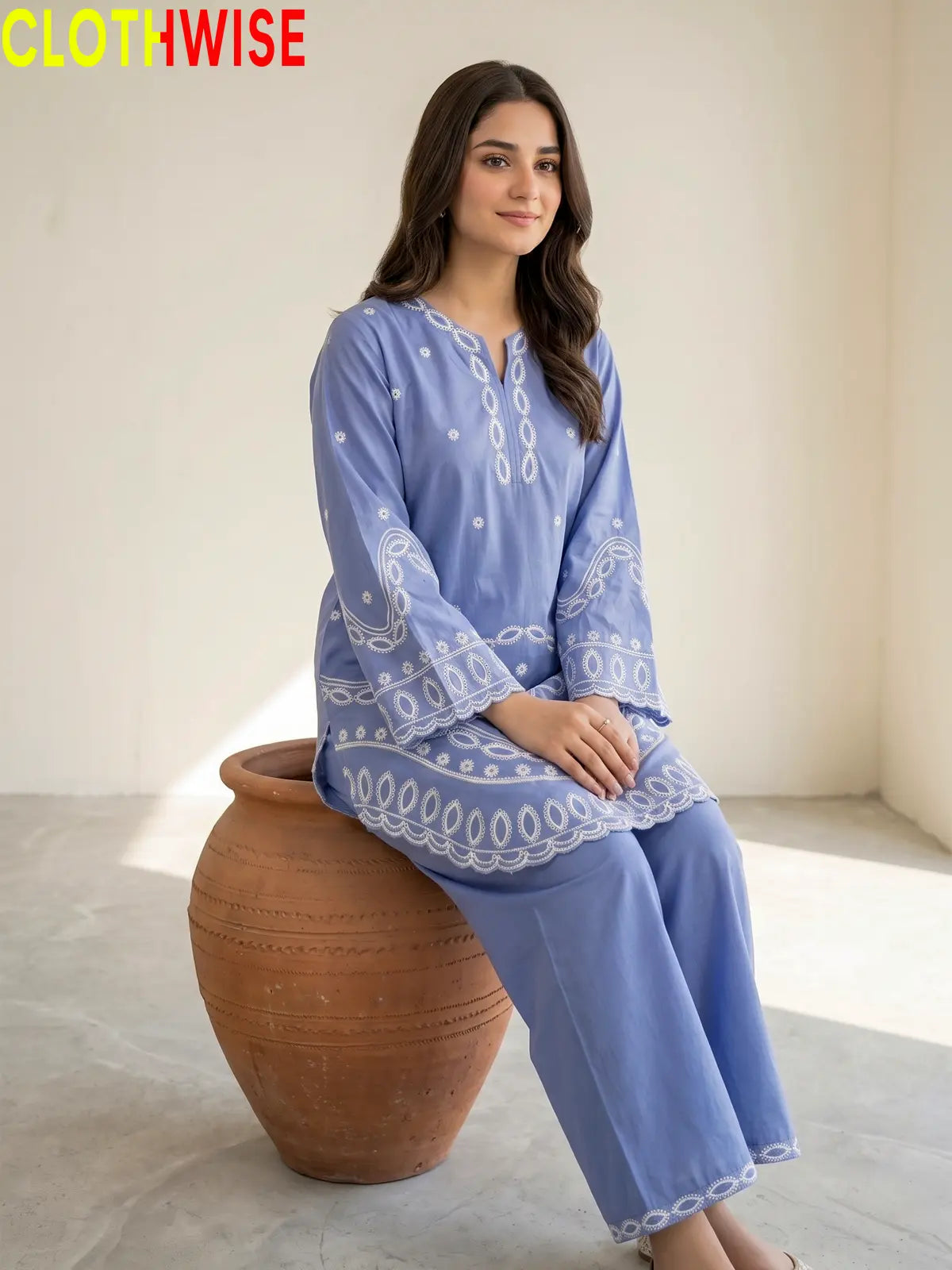Aarzo embroidered lawn suit sky blue sitting view