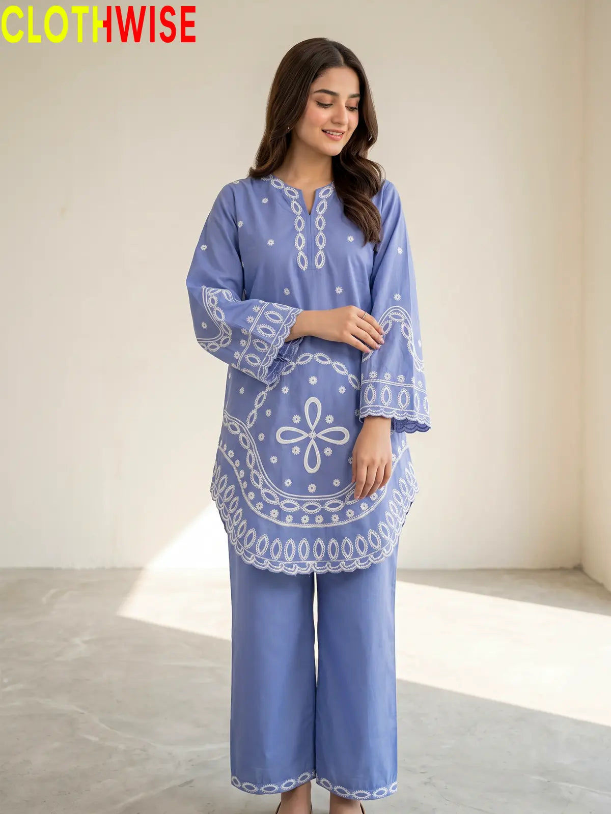Aarzo embroidered lawn suit sky blue front standing view