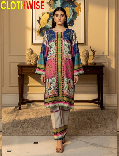 Woman wearing a colorful traditional outfit in an elegant room with decor.