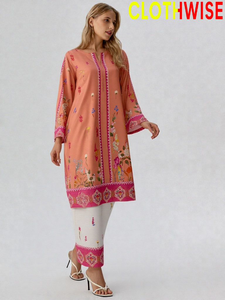 Woman wearing a peach-colored embroidered dress with white leggings on a gray background, branded 'ClothWise'.