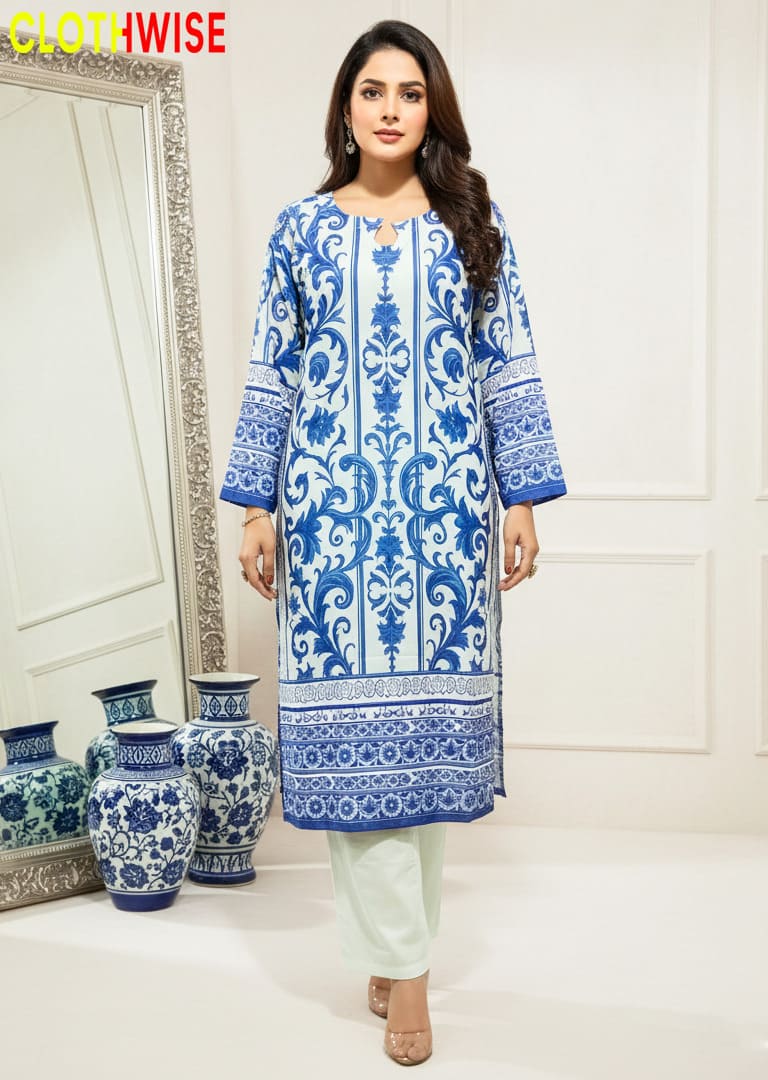 Woman wearing a blue and white patterned dress with vases and a mirror in the background, branded 'Clothwise'.