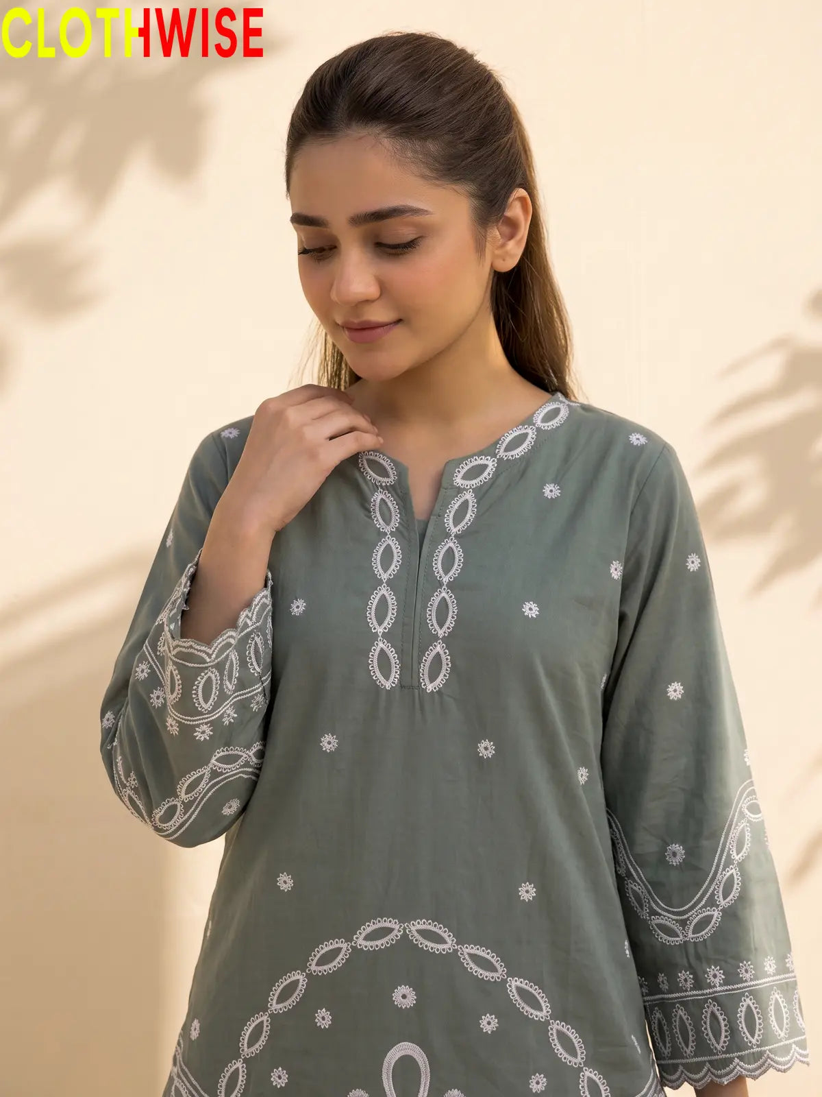 Aarzo embroidered lawn suit slate green embroidery closeup