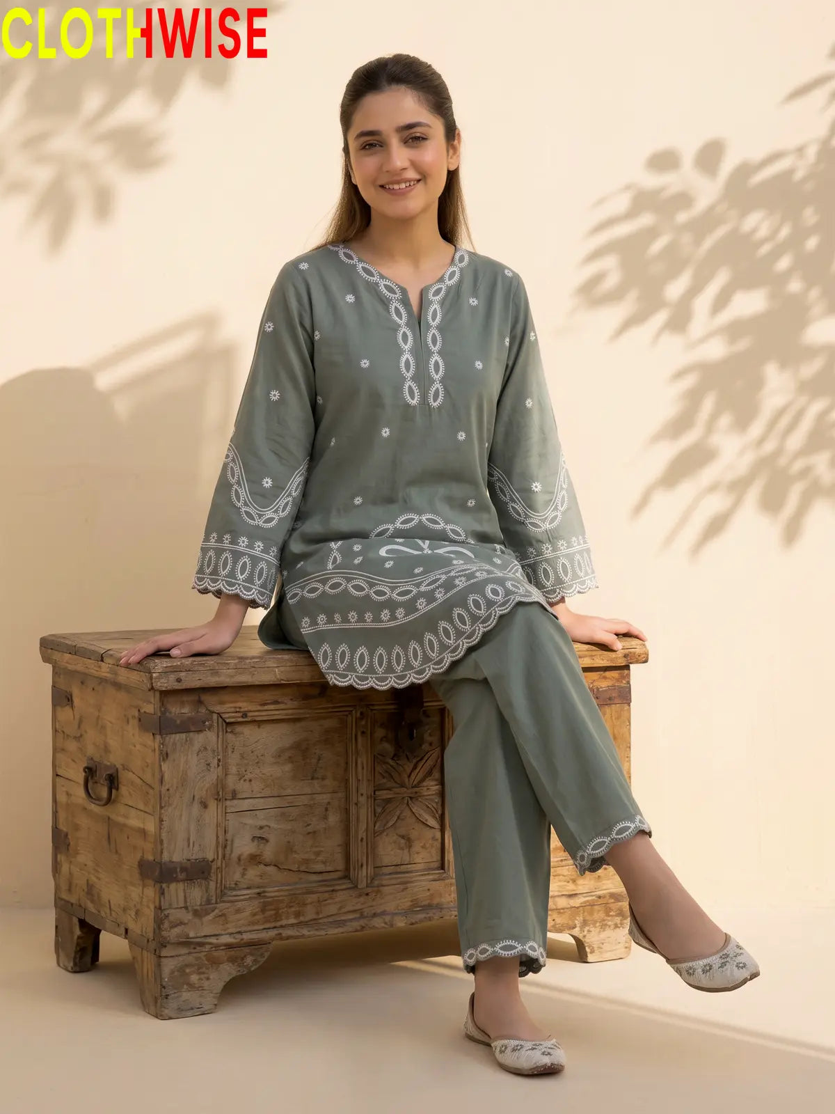 Aarzo embroidered lawn suit slate green sitting view