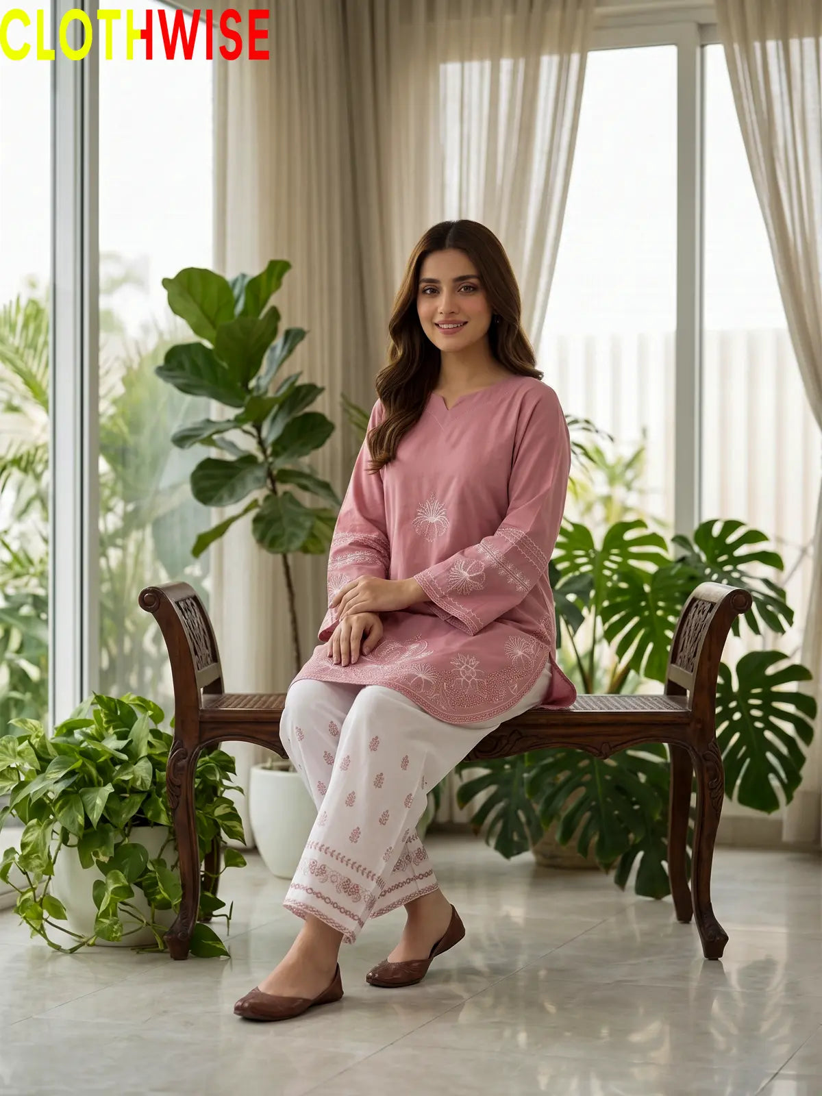 Petal dusty rose embroidered suit - sitting view showing flared bottom