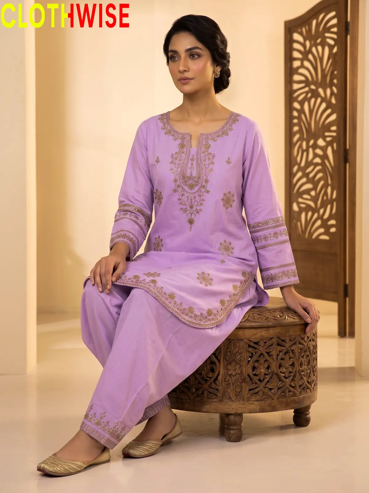Model sitting in Armaan Soft Lilac embroidered 2-piece lawn suit