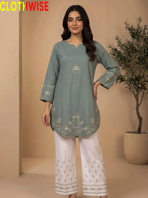 Petal embroidered cotton co-ord set in sage green - front standing view