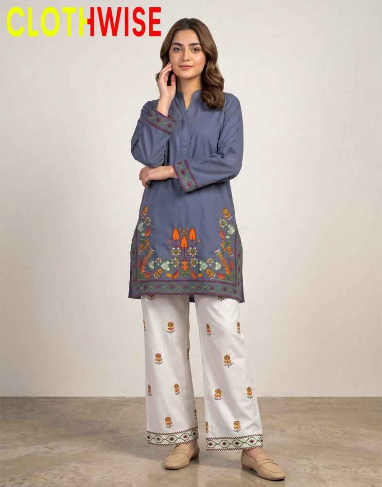 Woman wearing a blue embroidered kurta with white pants, standing against a plain background with 'CLOTHWISE' branding.