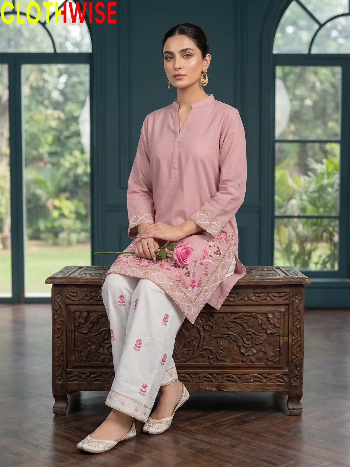 Shajar Tea Pink embroidered cotton suit sitting pose