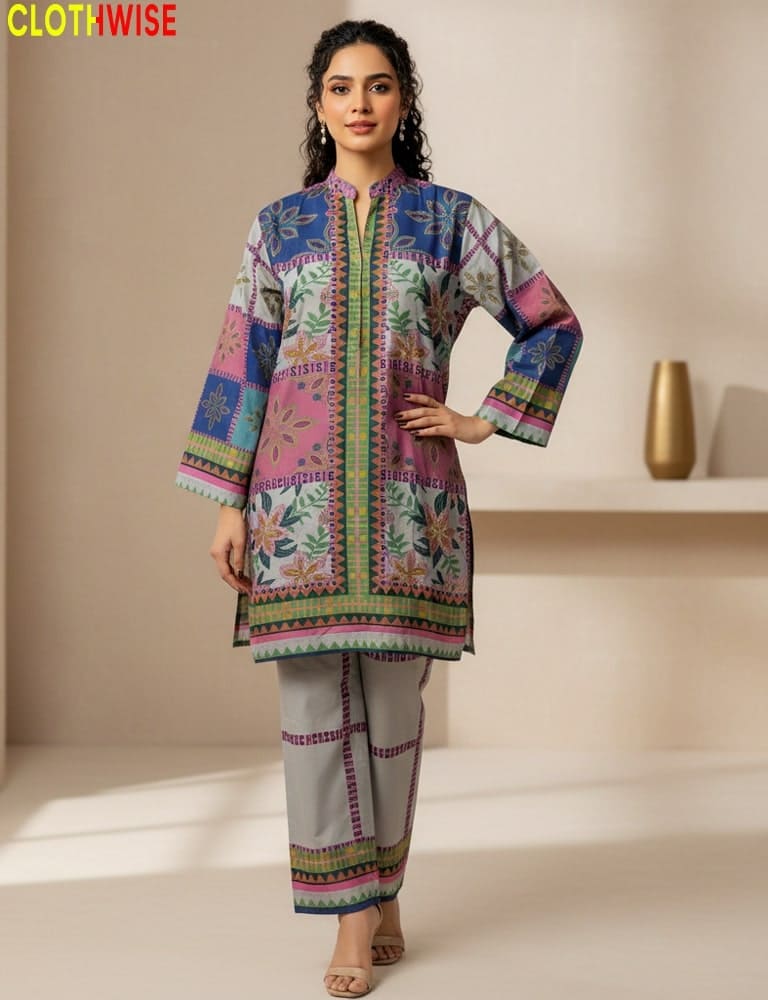 Woman wearing a colorful embroidered traditional outfit with a neutral background