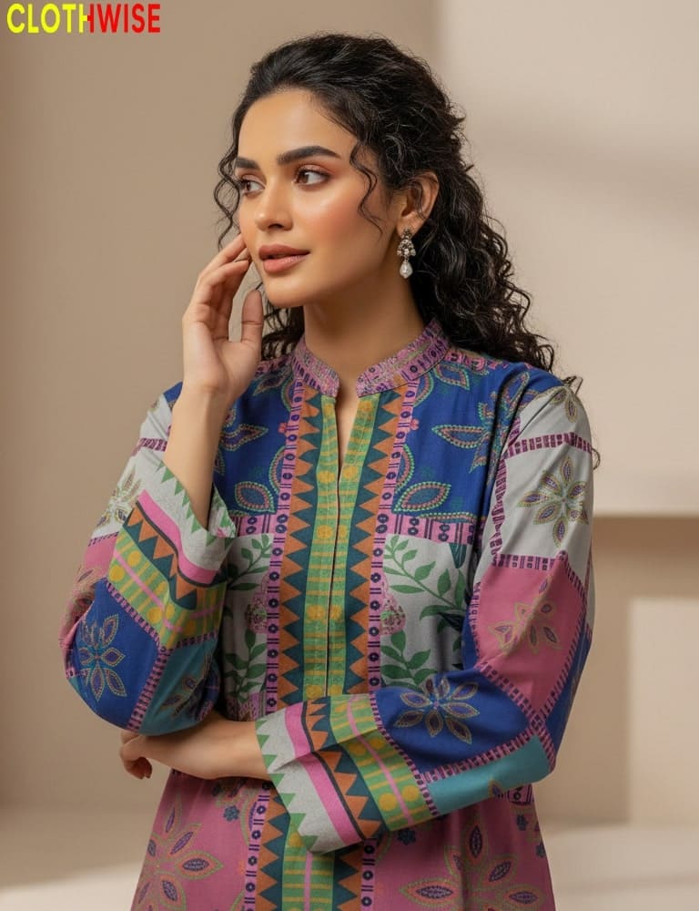 Woman wearing a colorful patterned shirt with 'Clothewise' branding.