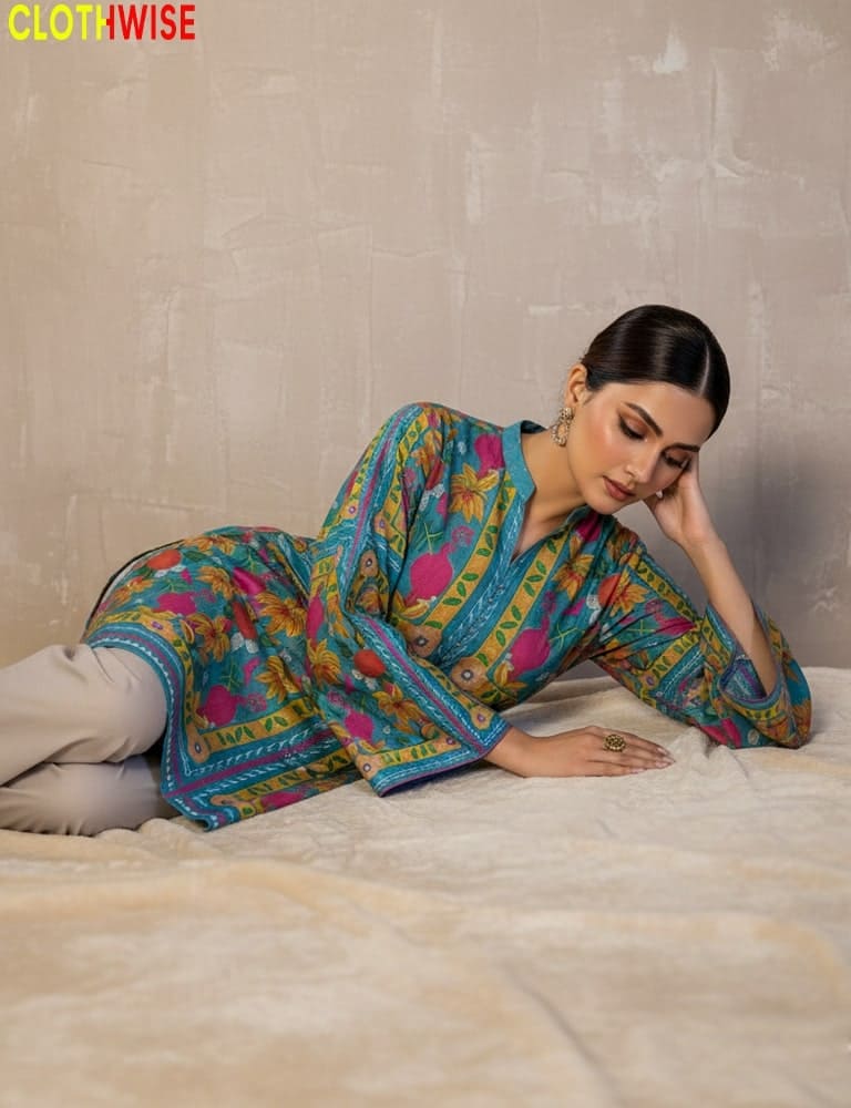 Woman wearing a colorful traditional outfit on a textured surface with 'ClothWise' branding.