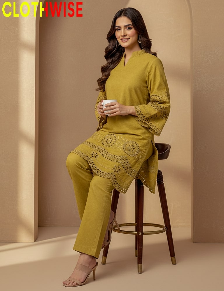 Woman in a yellow outfit sitting on a stool with 'CLOTHWISE' branding.