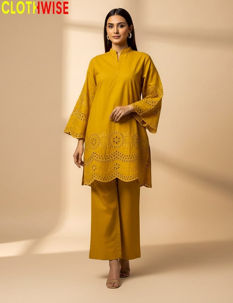 Woman wearing a mustard yellow outfit with intricate detailing on a beige background, branded 'Clothwise'.