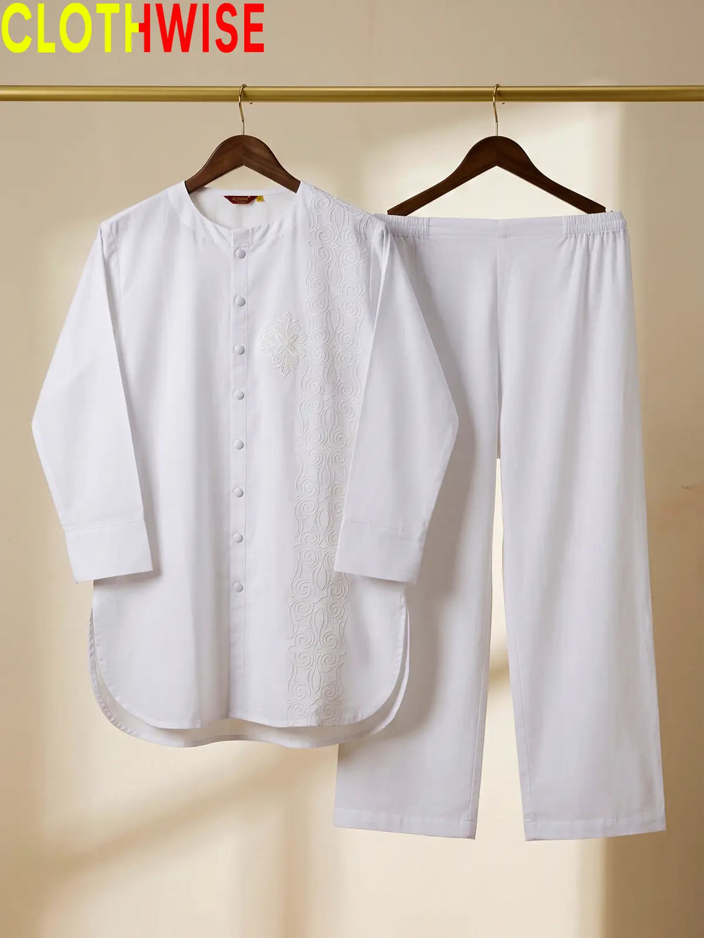 Azadi White One Side Embroidered 2-piece cotton lawn suit displayed on hanger