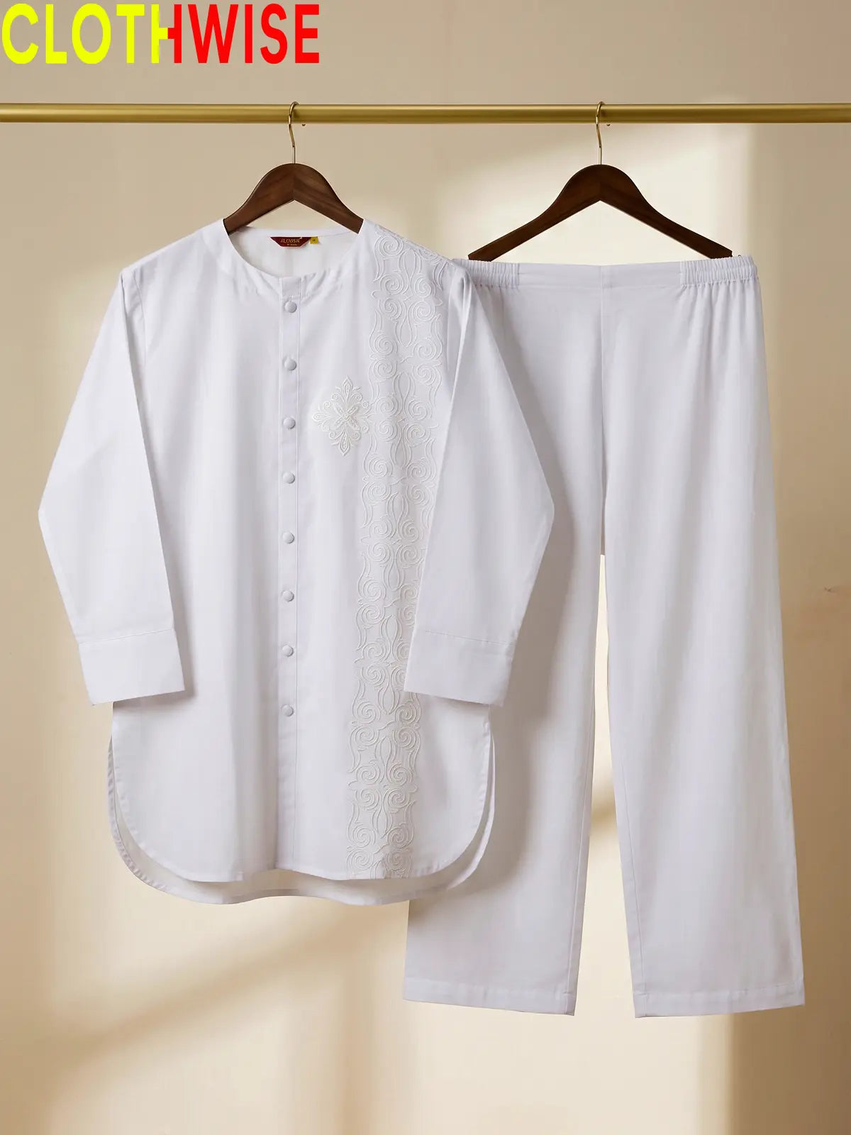Azadi White One Side Embroidered 2-piece cotton lawn suit displayed on hanger