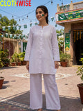 Azadi White One Side Embroidered 2-piece lawn suit, front standing view