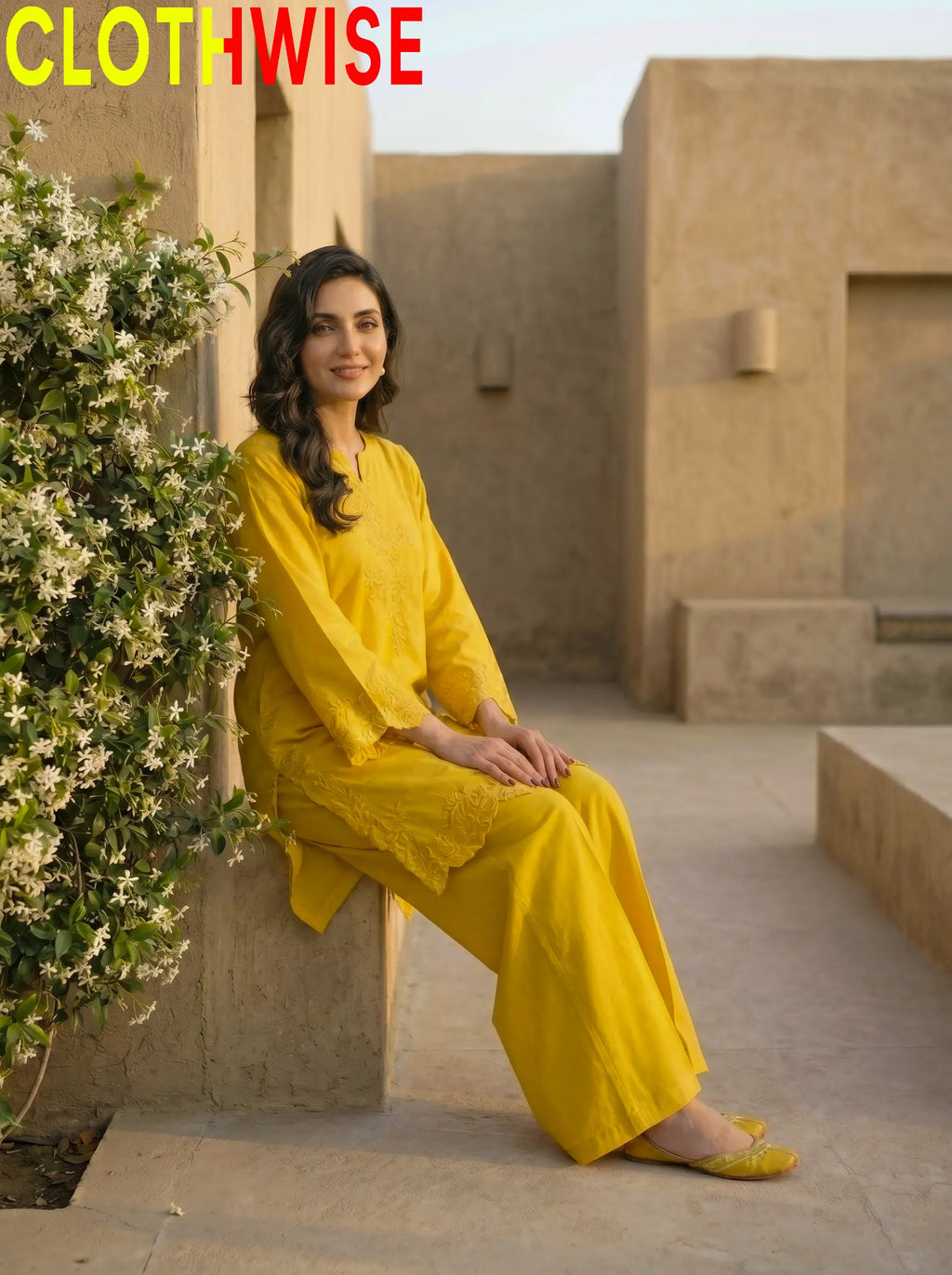 Gulkari Yellow Embroidered Suit with Flapper Bottom Sitting View – Clothwise